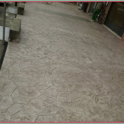 Pavimento portici in cemento stampato effetto pietra a Lodi